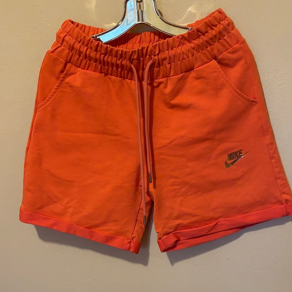 Nike Women's Vibrant Orange Sports Shorts